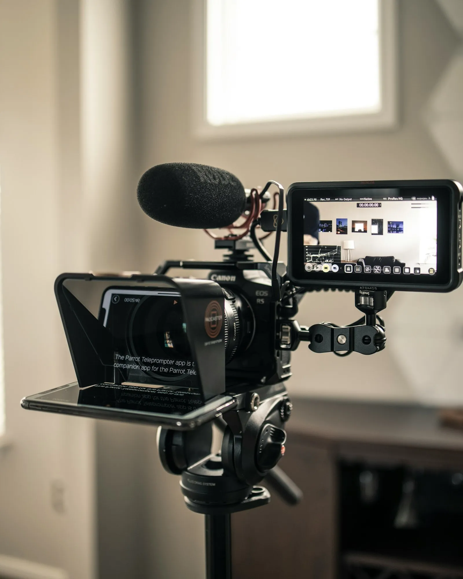 Teleprompter on a tripod in front of a camera